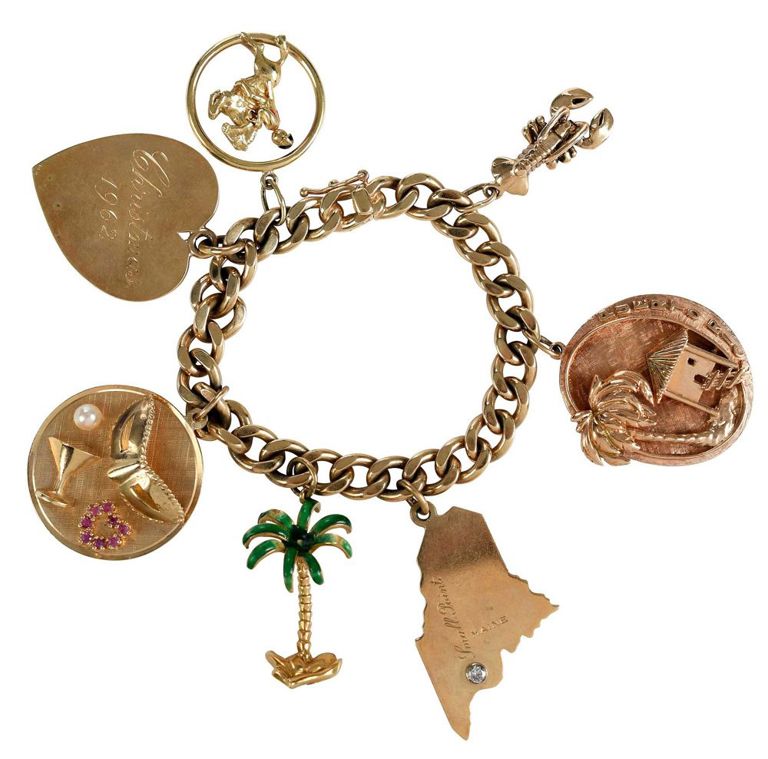 14k yellow gold large multi-charm bracelet