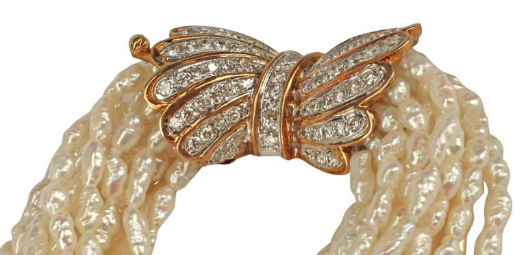 14k yellow gold and white gold torsade diamond necklace
