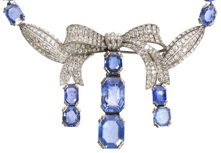 Platinum sapphire and diamond bow motif necklace