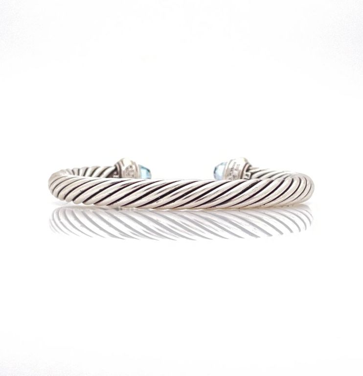 Sterling silver and 14k yellow gold blue topaz cuff