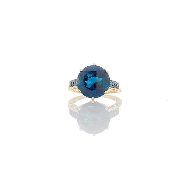 10k yellow gold blue topaz and diamond ring