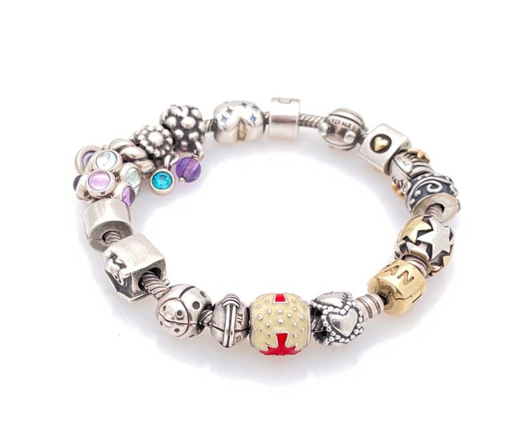 14k yellow gold and sterling silver charm bracelet