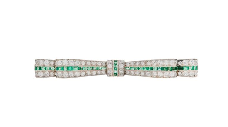 Platinum diamond and emerald brooch