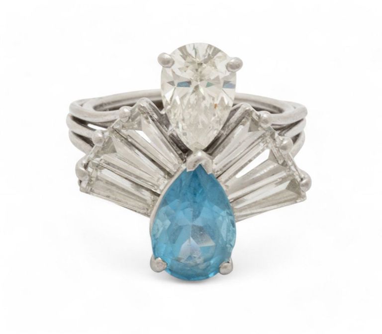Platinum diamond and blue topaz ring