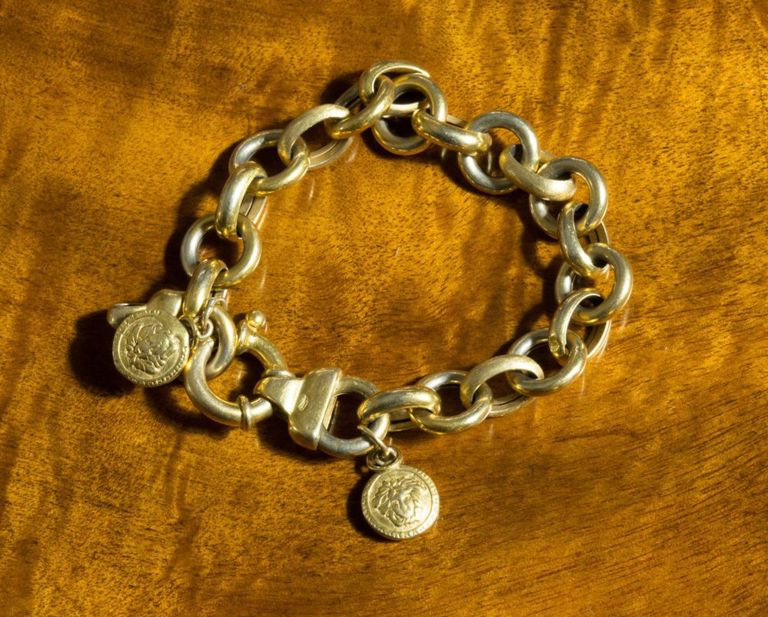 14k yellow gold chain bracelet with charms