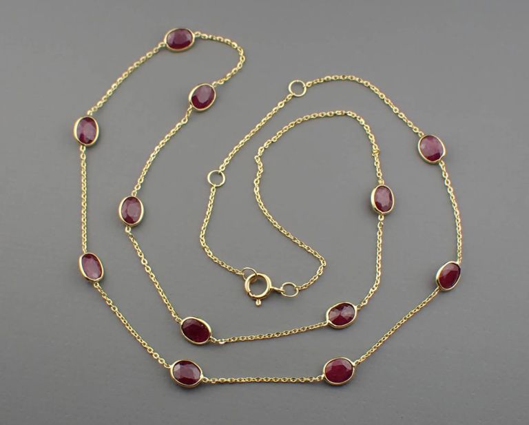 18k gold ruby station necklace