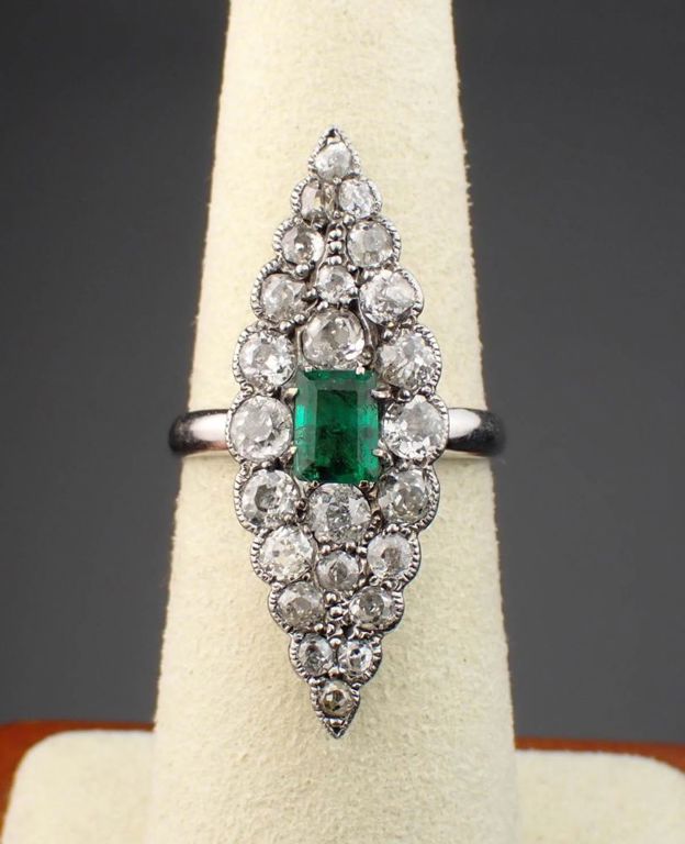 14k white gold emerald diamond navette ring
