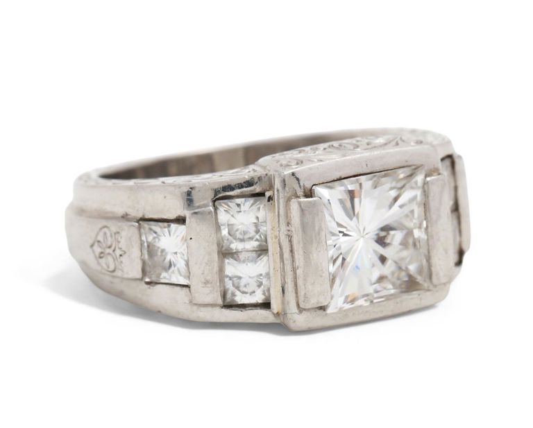 Platinum colorless stone ring