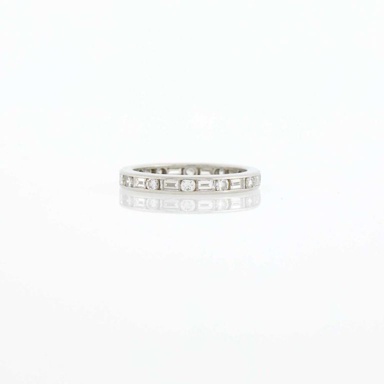 Platinum and diamond band ring