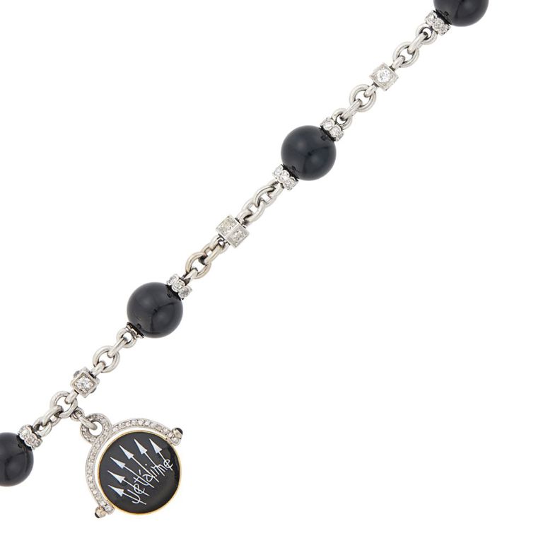 Platinum gold black onyx enamel diamond charm bracelet