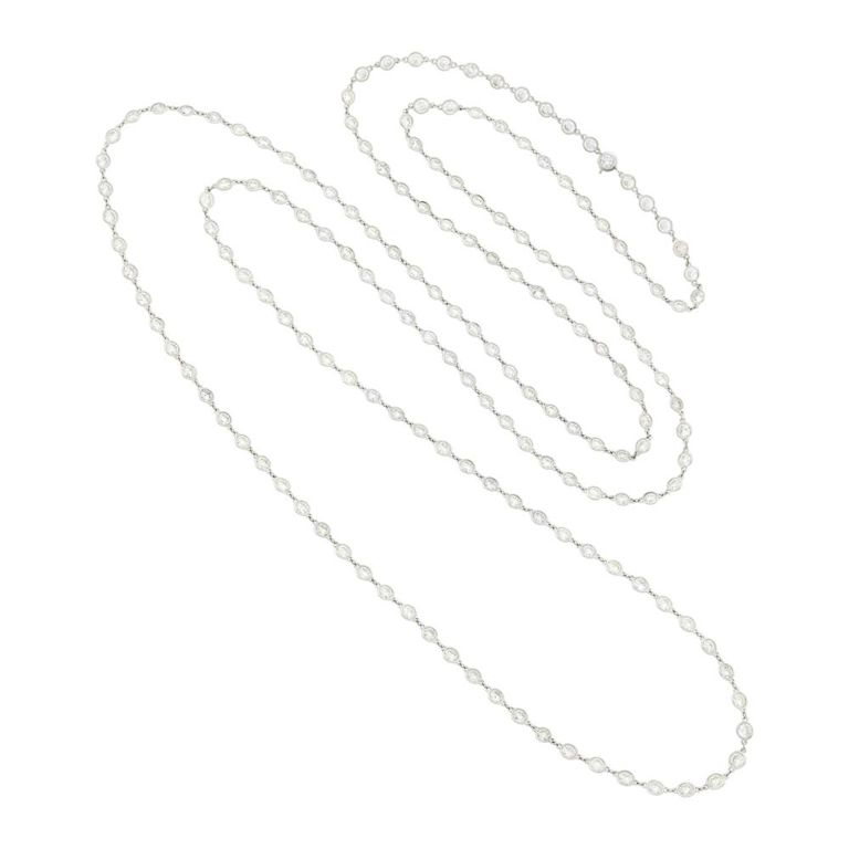 Long platinum and diamond chain necklace