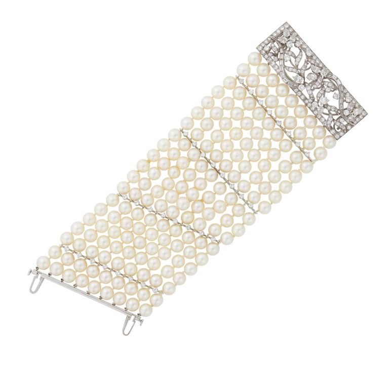 Nine-strand platinum pearl and diamond bracelet