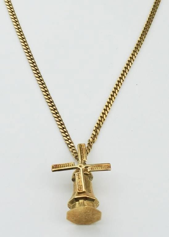 14k yellow gold windmill pendant on flat curb chain