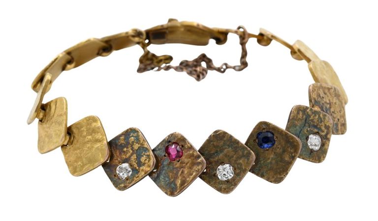 14k yellow gold diamond and red and blue stone bracelet