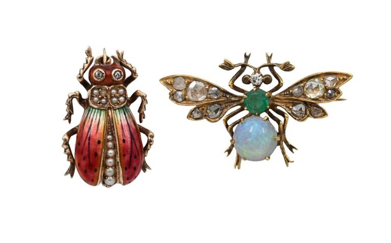 Two 18k yellow gold bug brooches