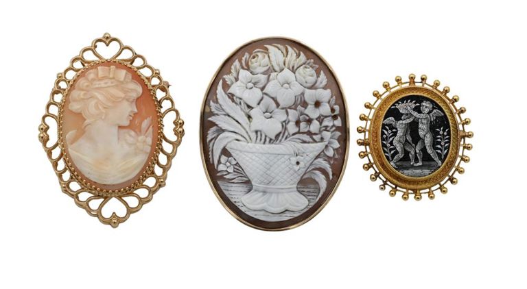 Three 14k gold brooches