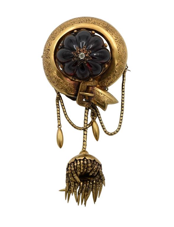 14k yellow gold diamond and red stone brooch