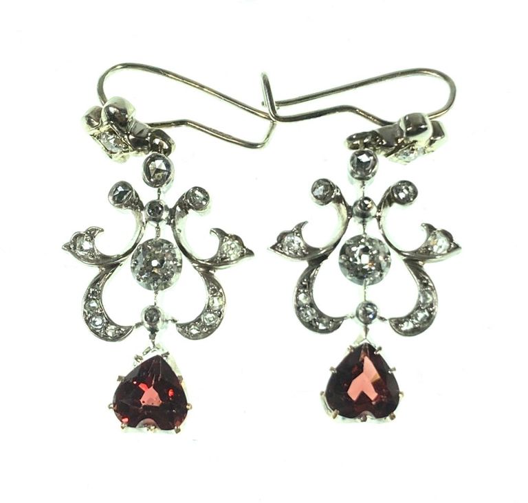 Pair of garnet and diamond dangle earrings