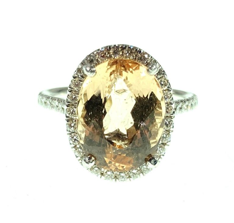 18k white gold, topaz and diamond ring