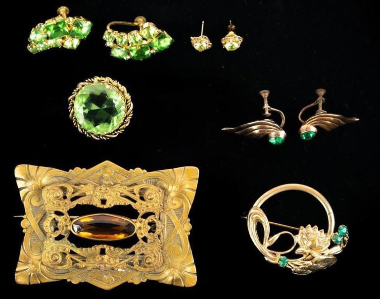 Vintage costume jewelry lot with brooches and earrings