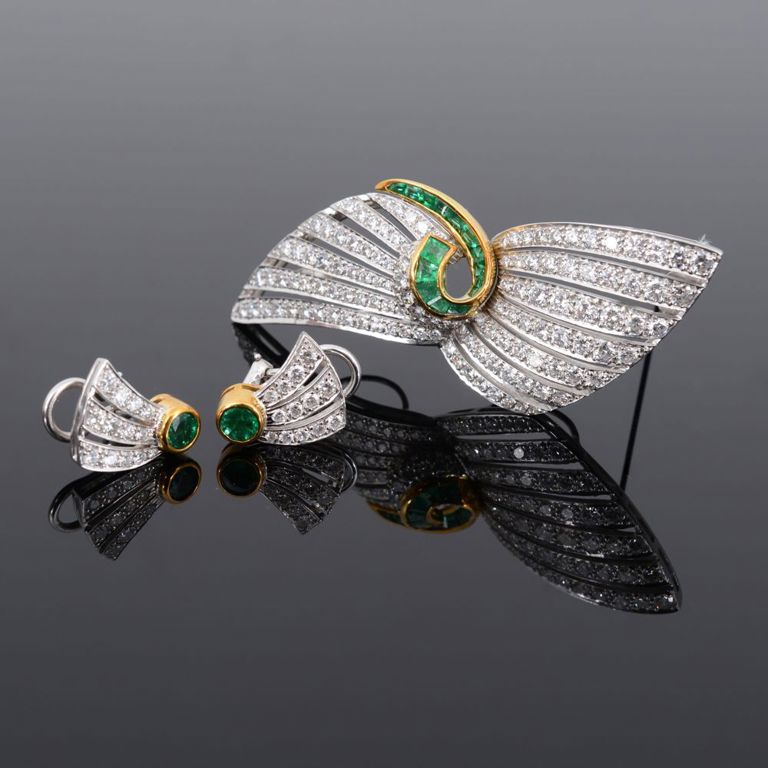 18k gold emerald and diamond set
