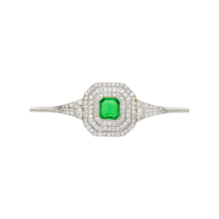 Platinum emerald diamond brooch