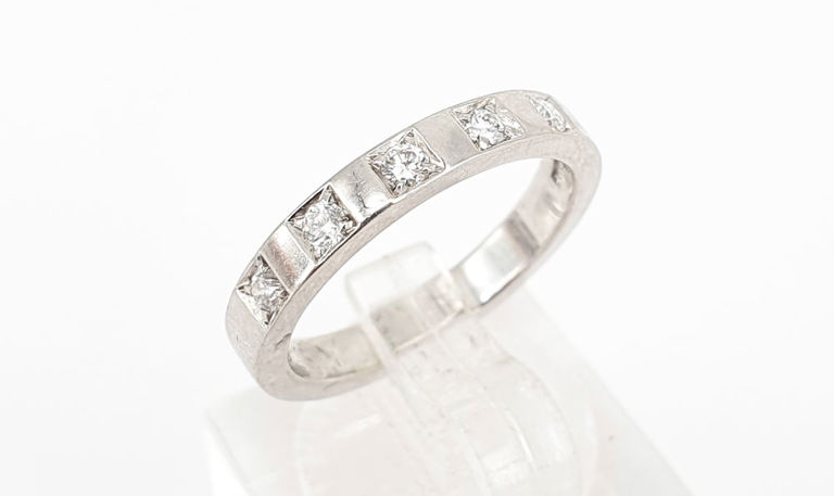 Platinum half-hoop diamond ring