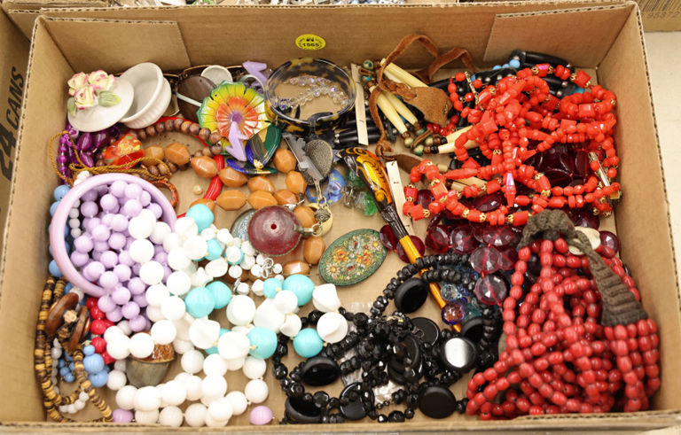 Assorted costume jewelry box