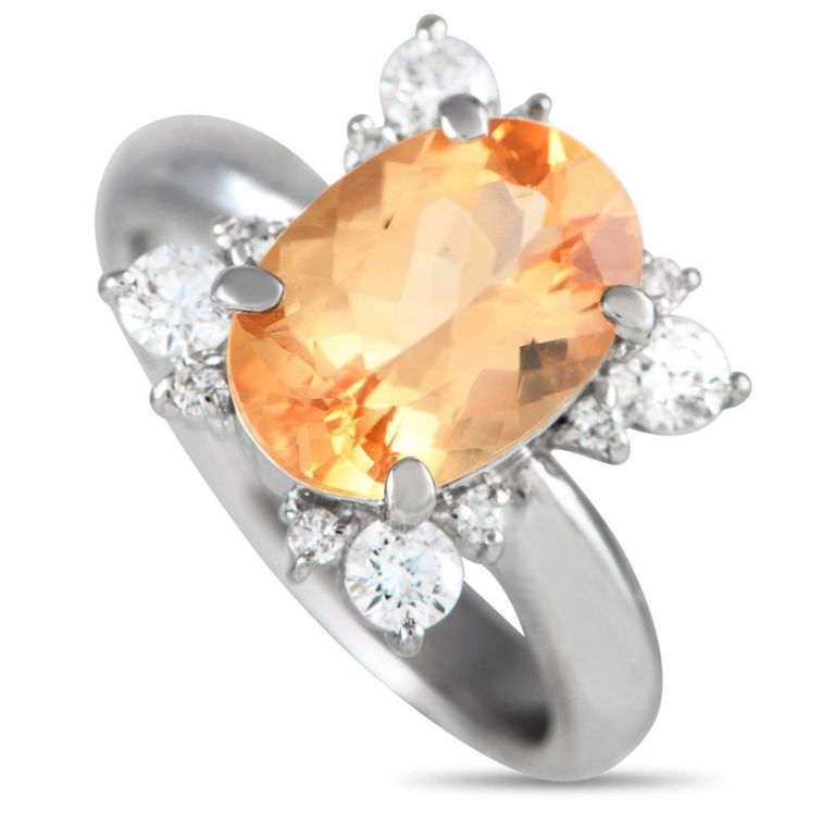 Platinum diamond topaz ring