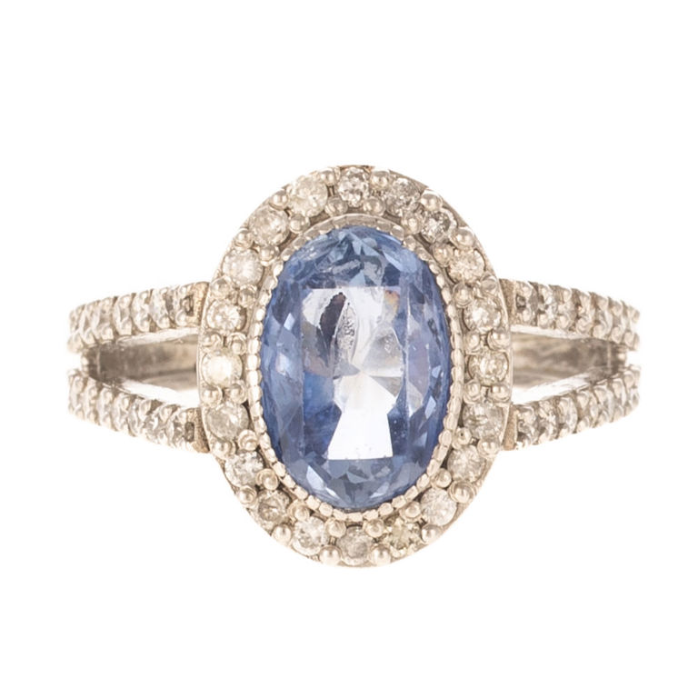 Platinum blue sapphire and diamond halo ring