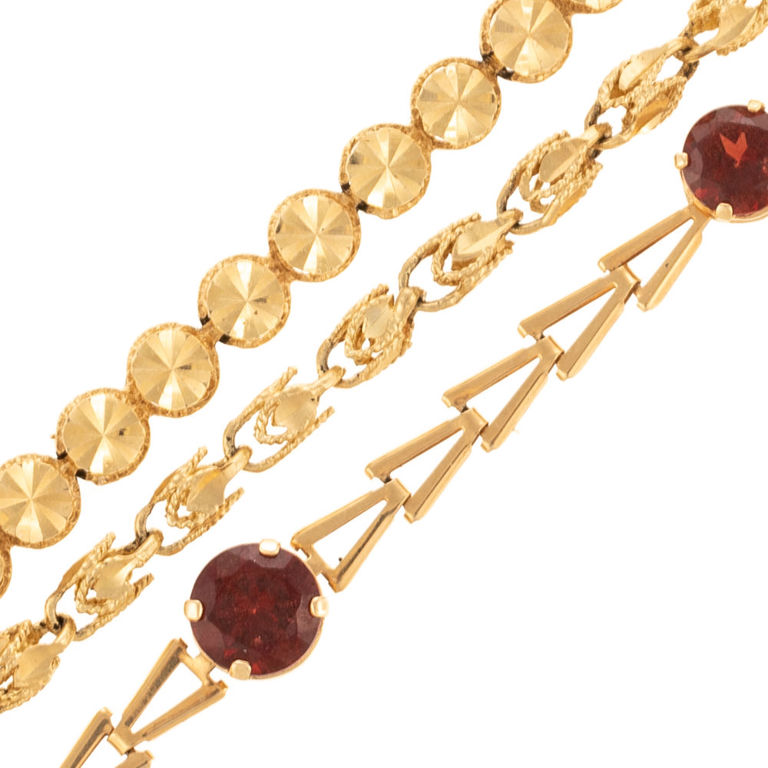 Three 14k yellow gold unique link bracelets