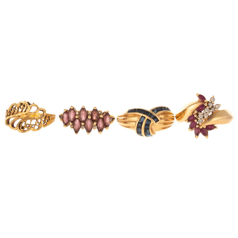 Four 18k gold and 14k gold rings