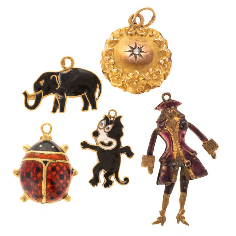 Group of vintage charm pendants