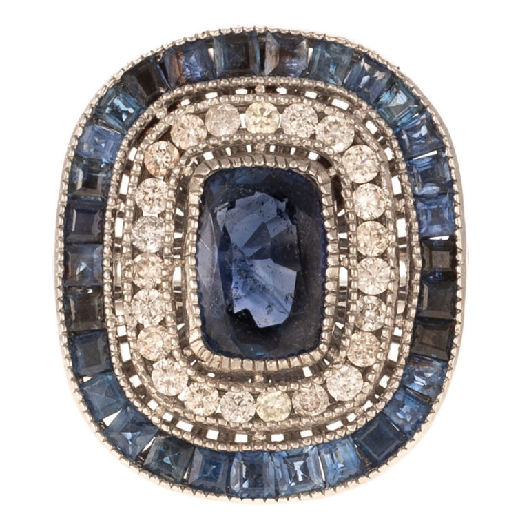 Platinum sapphire and diamond halo ring