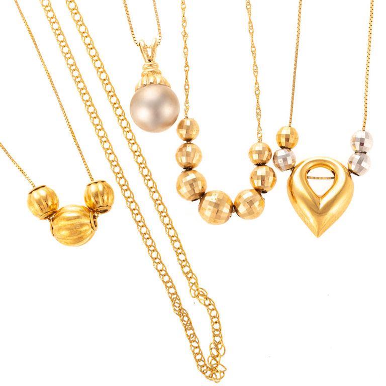 Collection of 18k and 14k gold chains and pendants