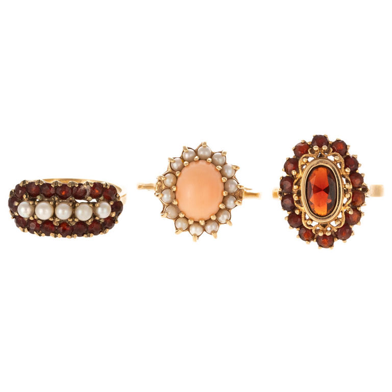 Three yellow gold pearl and gemstone cluster rings