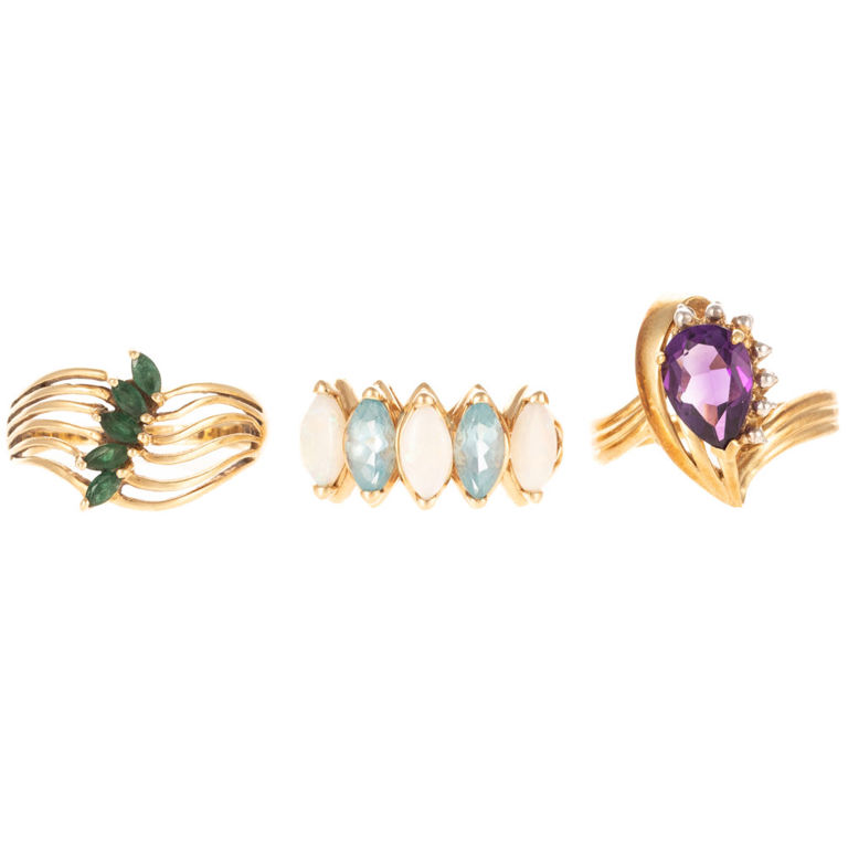Three 14k yellow gold gemstone rings
