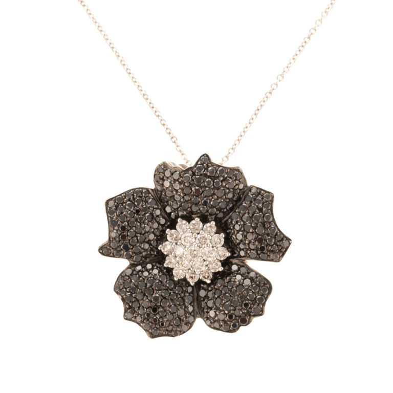 18k white gold diamond flower pendant on necklace