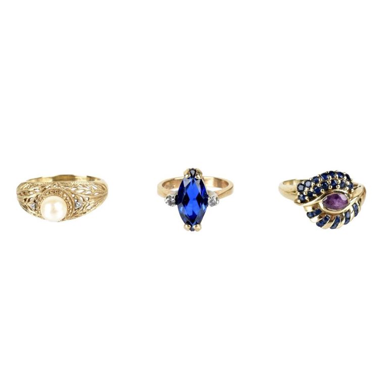 Three 10k yellow gold gemstone rings