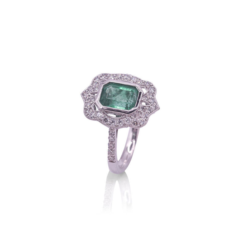 Platinum emerald and diamond ring