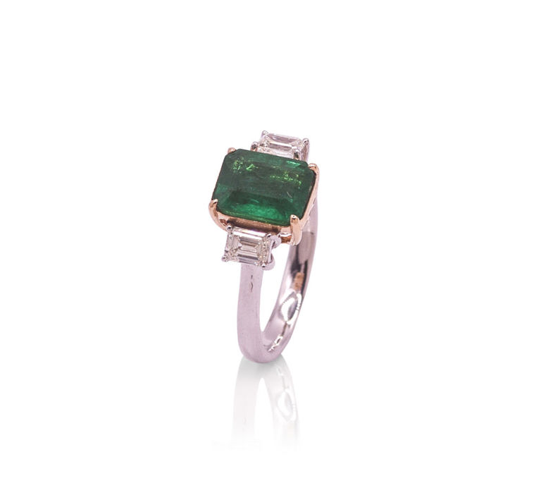 Platinum and 18k gold emerald ring