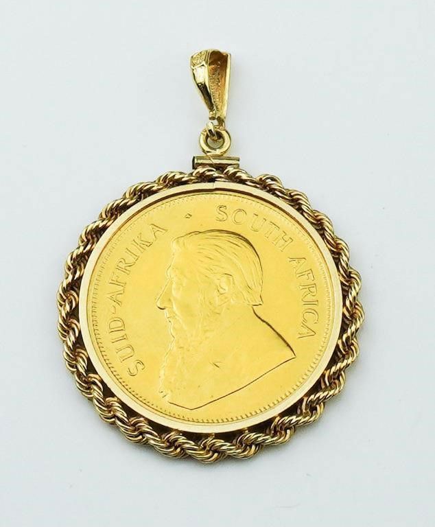 14k yellow gold Krugerrand pendant