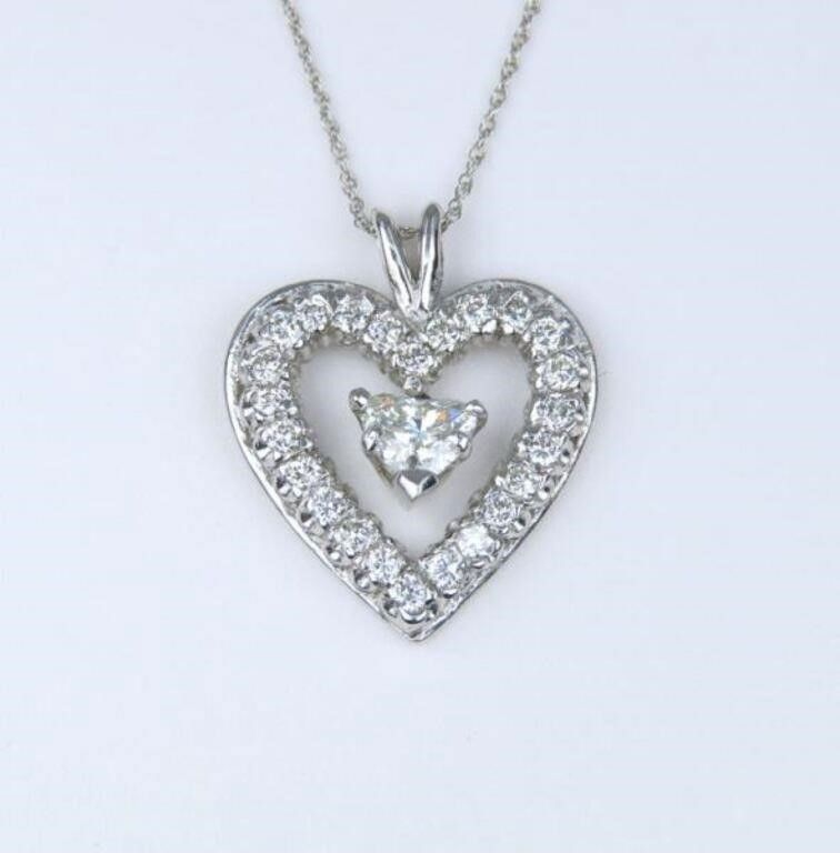 14k white gold diamond heart pendant on necklace