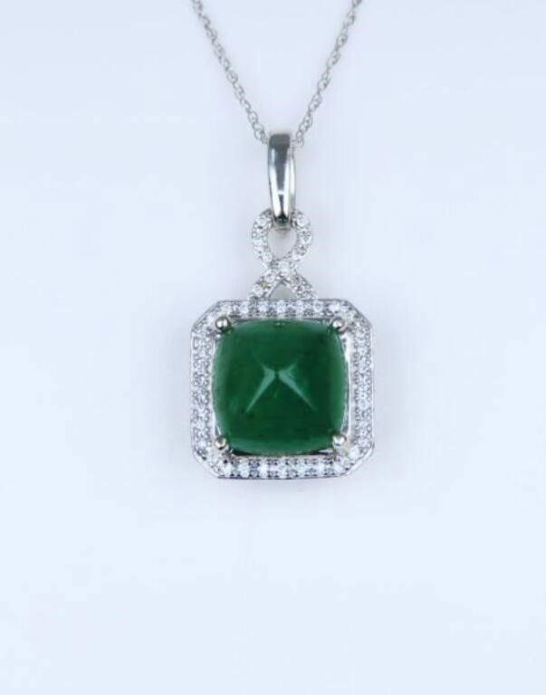 14k white gold emerald and diamond pendant on necklace