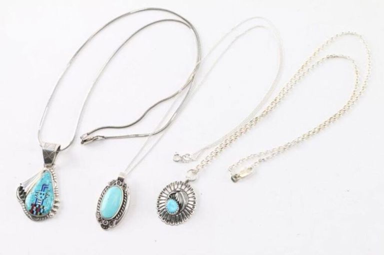 Three sterling silver turquoise pendants on necklaces