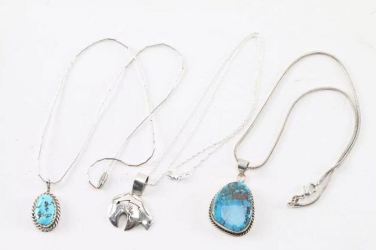 Three sterling silver turquoise pendants on necklaces