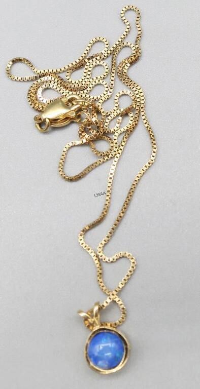 14k yellow gold opal pendant on necklace