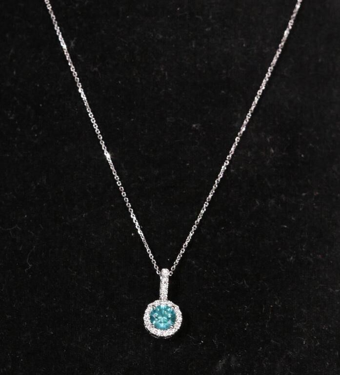 18k white gold blue stone and diamond pendant on necklace