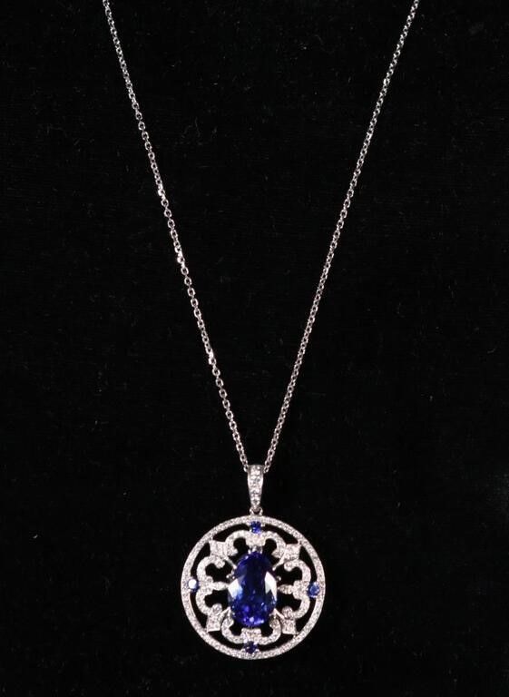 18k white gold tanzanite and diamond pendant on necklace