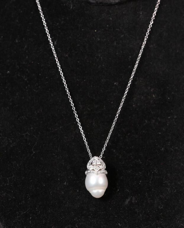 18k white gold pearl and diamond pendant on necklace